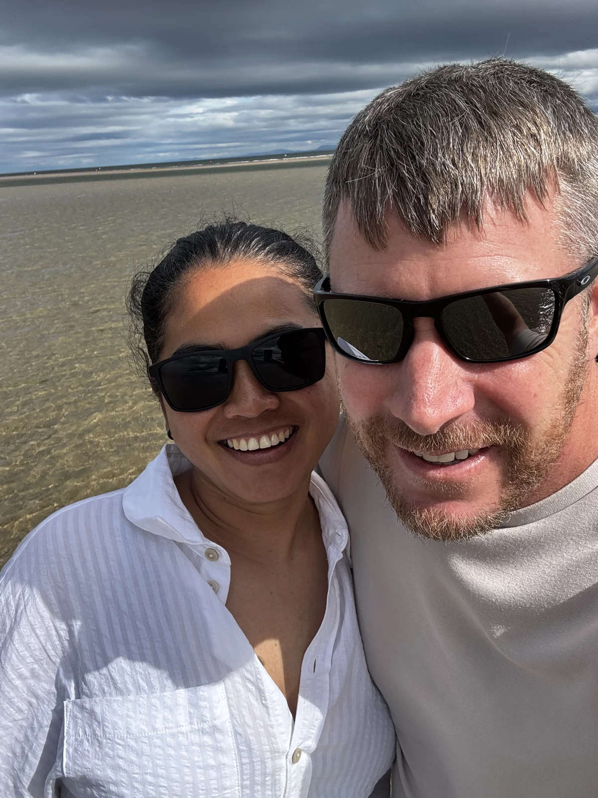Nat and Stuart together on a beach